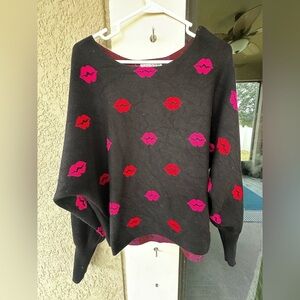 Chic Black Sweater with Red and Pink Lips